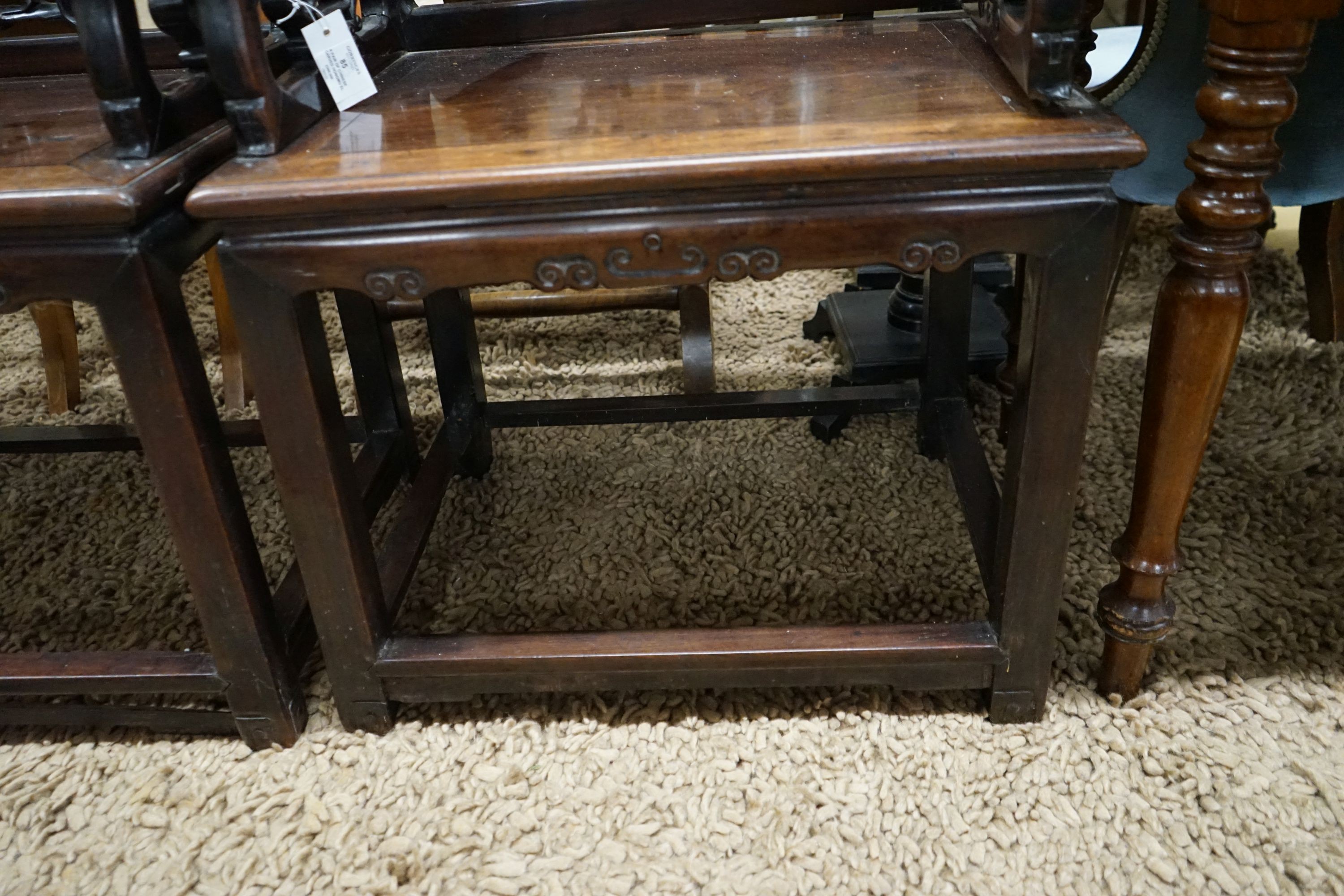 A pair of Chinese carved hongmu elbow chairs (a.f.), width 65cm, depth 48cm, height 96cm
